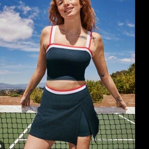 Beyond Yoga Navy Blue Tennis Skirt with Red and White Trim